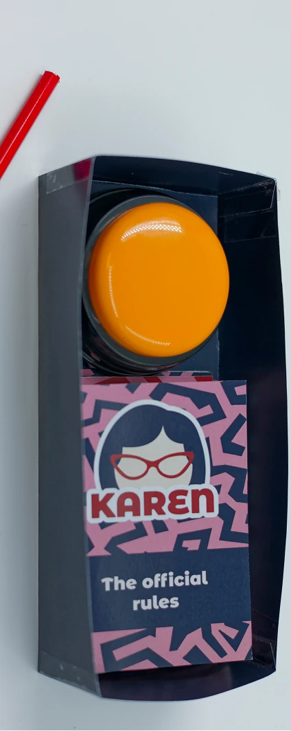 Boîte ouverte avec buzzer et livret de règles